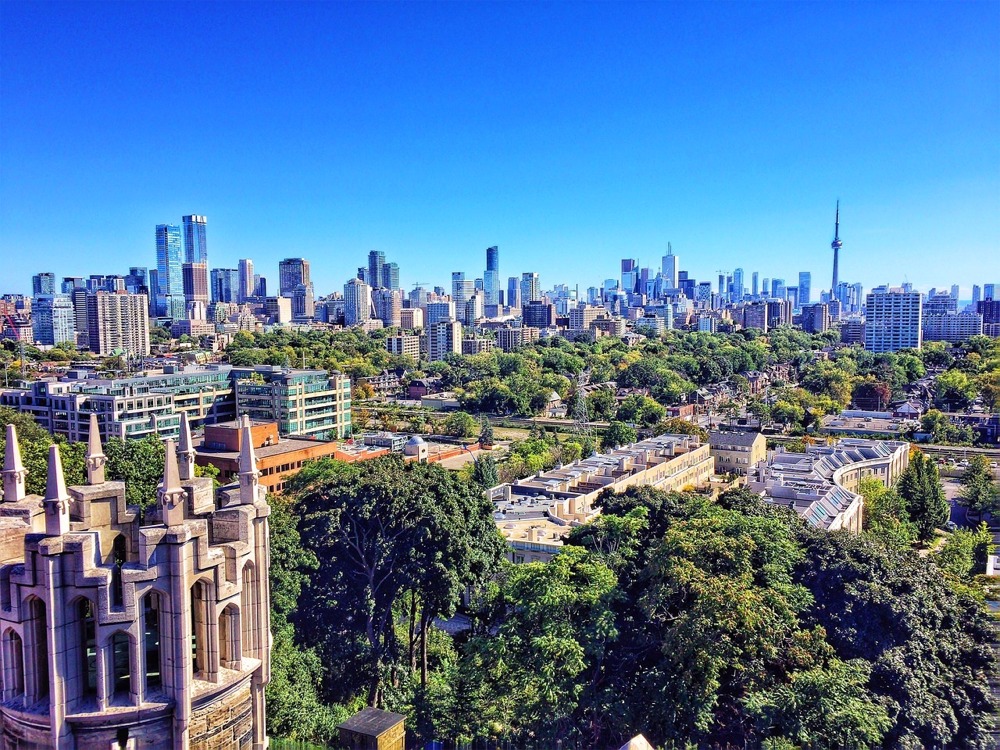 Photograph of the Toronto Ontario Canada skyline / cityscape on a bright sunny day.