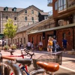 People walking in the Distillery District of Toronto, Ontario, Canada.