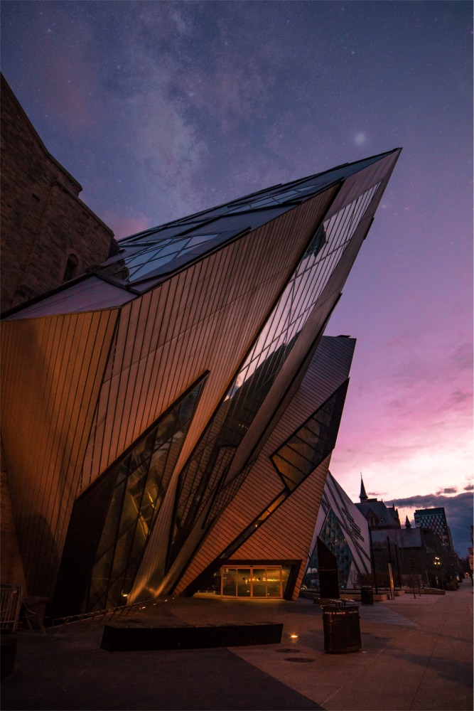 This photograph is of the Royal Ontario Museum in Toronto, Canada. The photo features the Michael Lee-Chin Crystal at sunset.