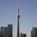 The CN Tower from the Grange Park neighbourhood of Toronto, Ontario, Canada on a bright sunny day.