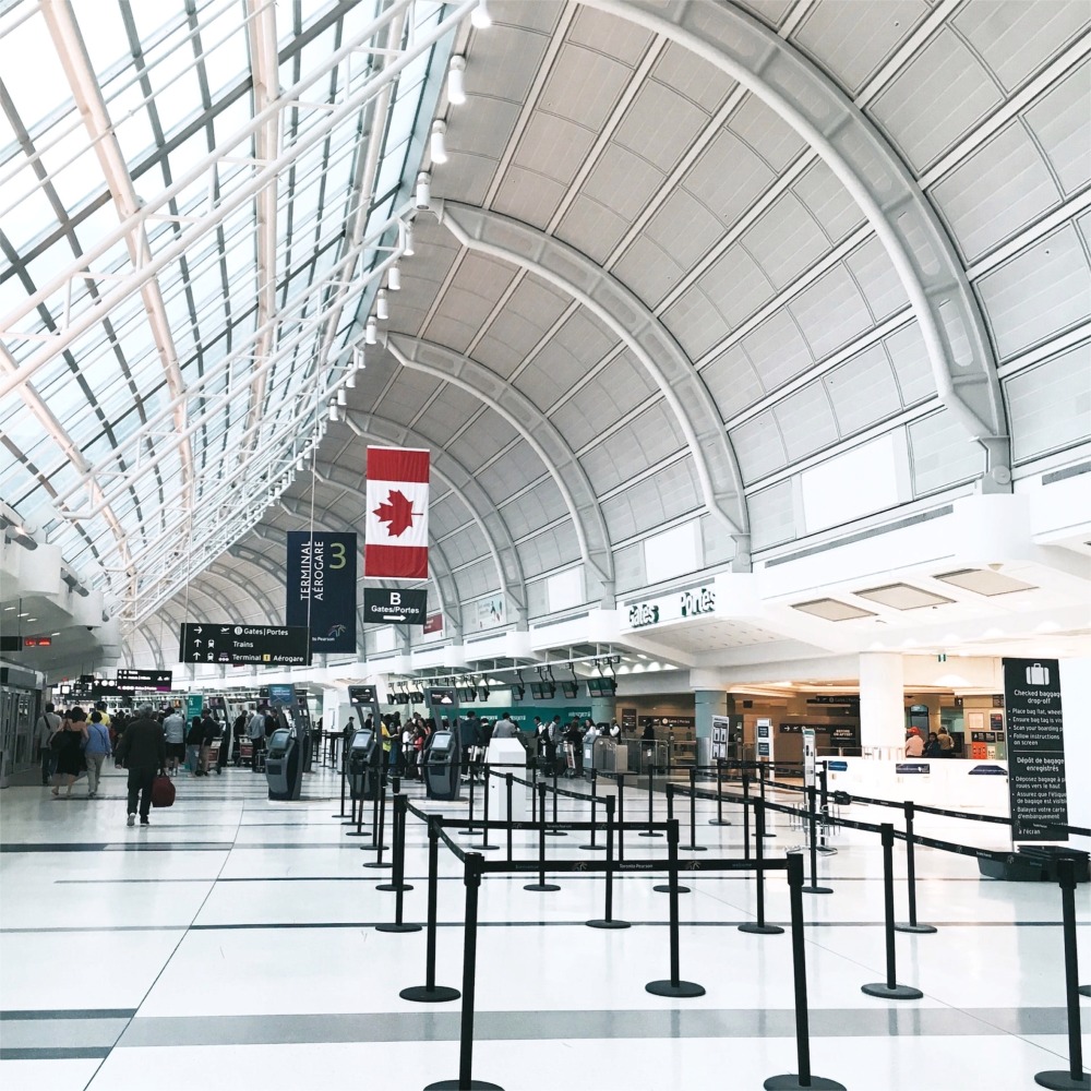 This is a photograph taken inside Terminal 3 of the Toronto Pearson International Airport, Ontario, Canada.