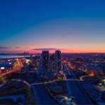 Toronto, Ontario, Canada cityscape at twilight. Taking this photo above Fort York National Historic Site, we can see the wind turbine at Exhibition Place.