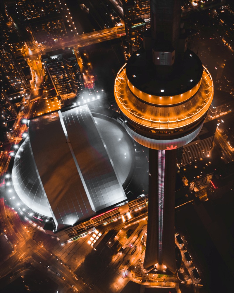WOW, what a beauty! This heavenly high-angle photograph shows the Rogers Centre and the CN Tower at night in Toronto, Ontario, Canada.