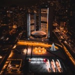 Nathan Phillips Square, the Star Stage, 3D Toronto sign, reflecting pool, and the City Hall, Toronto, Ontario, Canada.