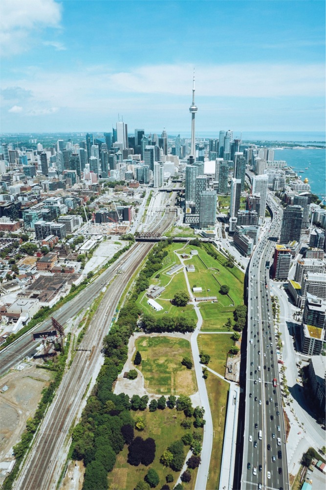 Toronto cityscape - Fort York National Historic Site, the Gardiner Expressway, and the CN Tower.