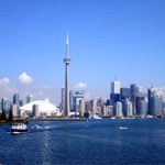 The quintessential Toronto skyline with Lake Ontario in the foreground.